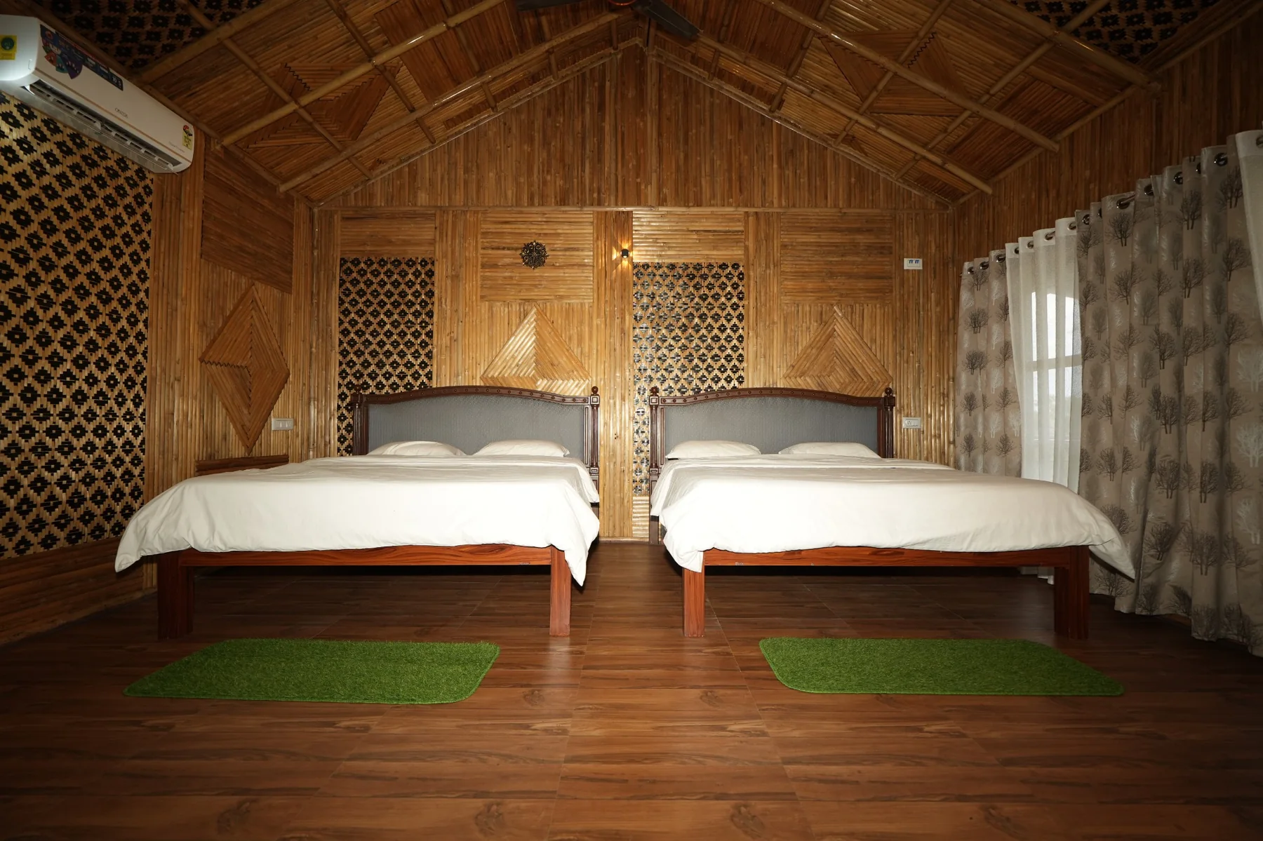 Bamboo themed room with two beds
